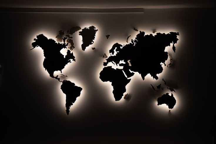 Backlit illuminated world map silhouette